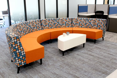 A colorful seating area in Grand River Aseptic Manufacturing. 